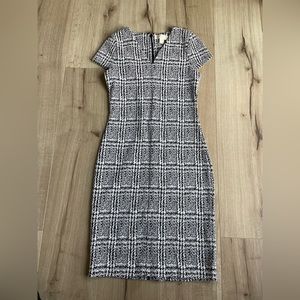 Calvin Klein, brand new. Back slit not cut